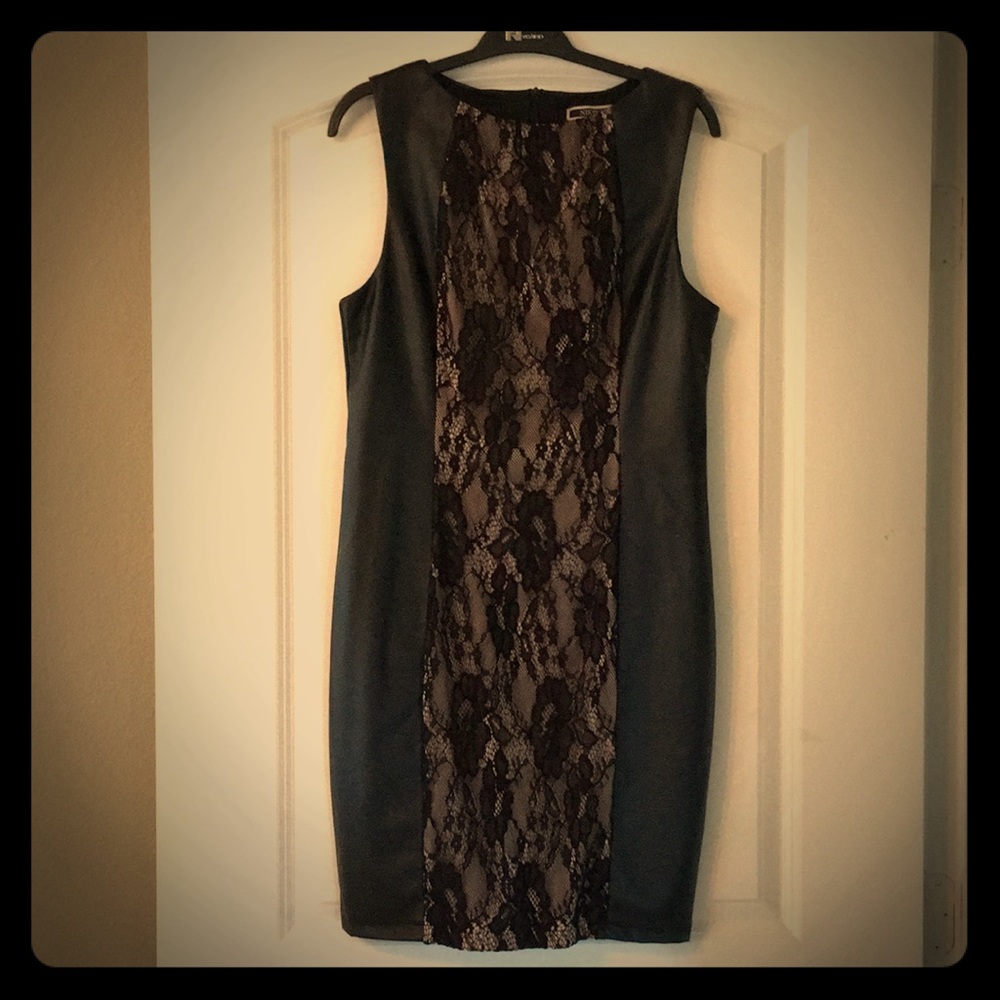 Black faux leather dress with lace on front.